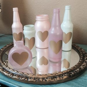 Lovely upcycled bottles with gold heart decal