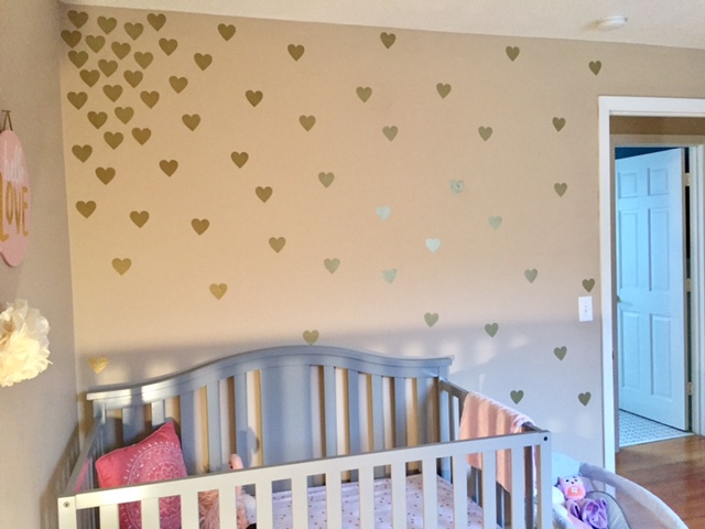 baby girl nursery with mint, coral and gold